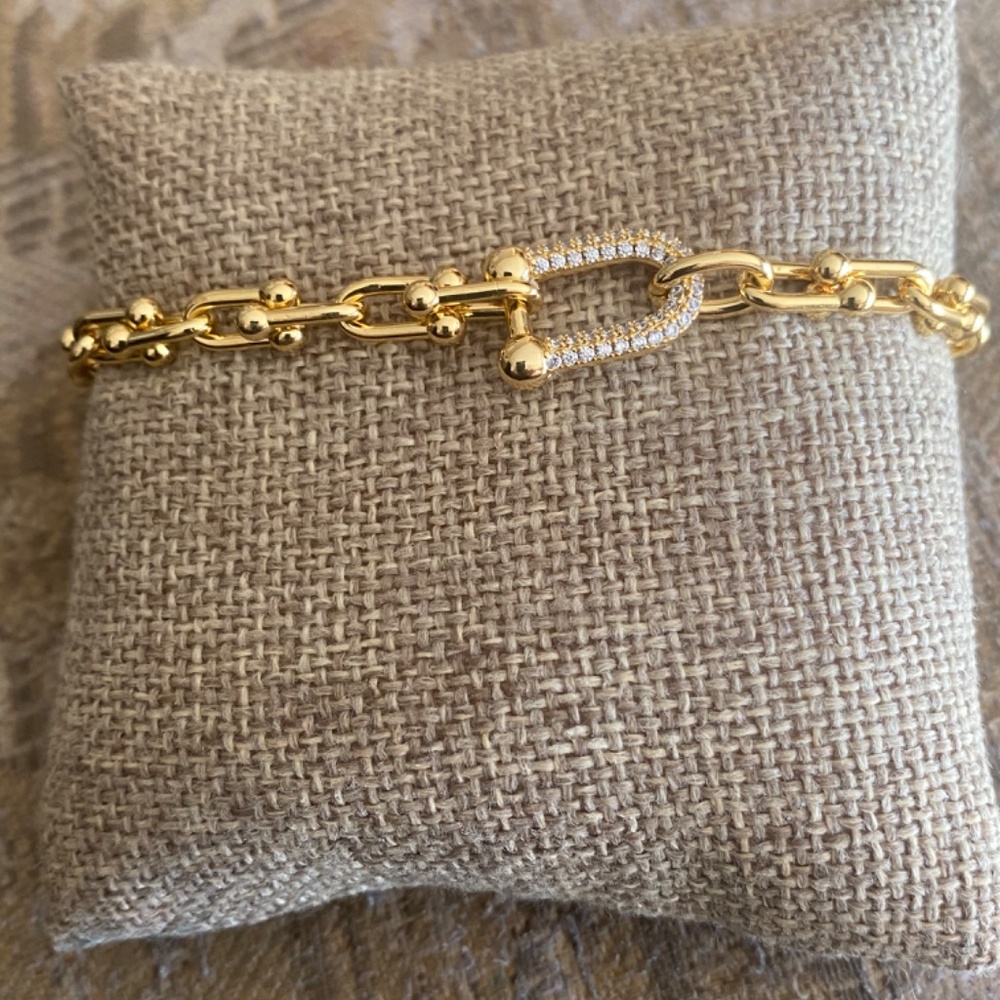 14 kt Gold plated link and cz woman’s bracelet.adjustable size. Beautiful pc
